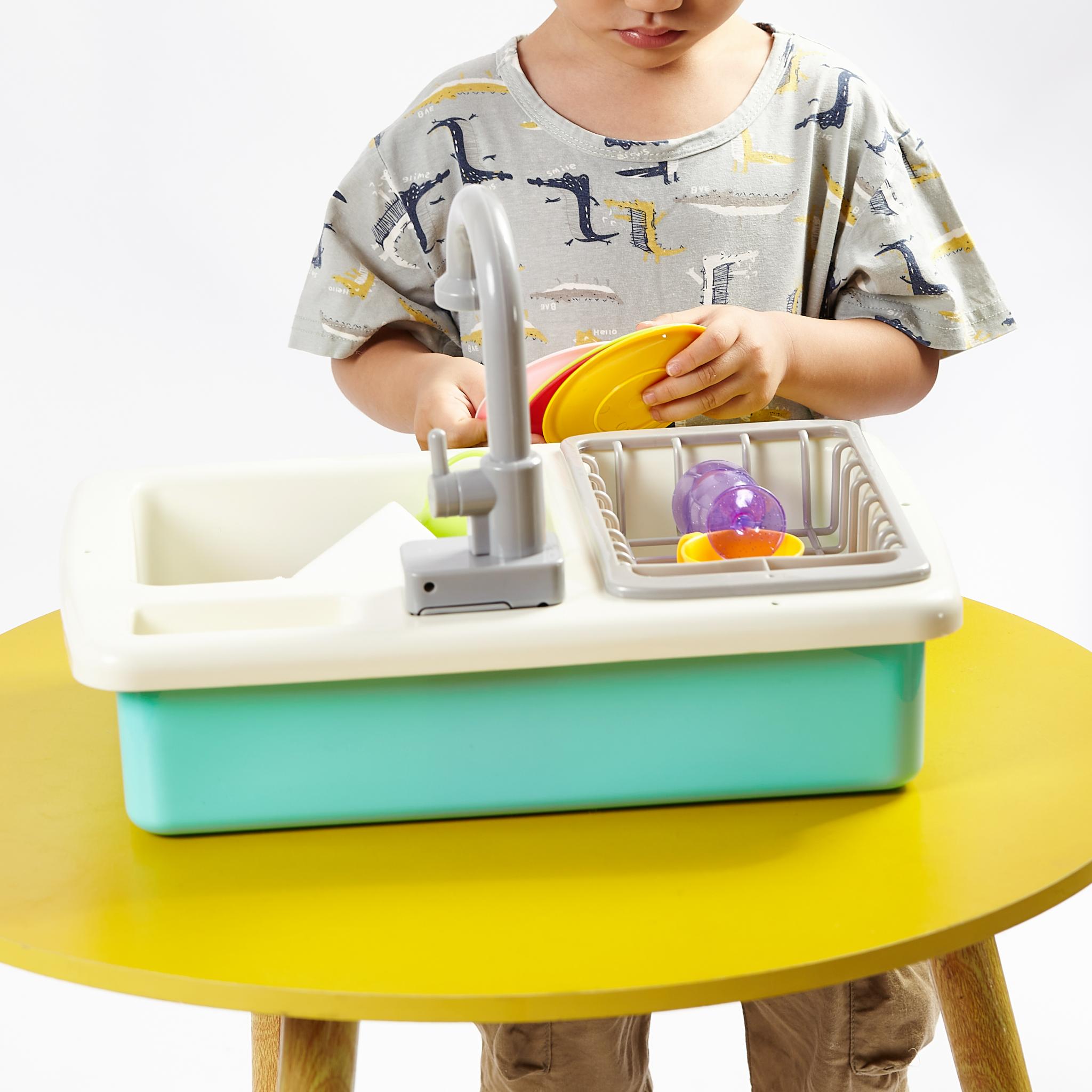 Sustainable kitchen sink including dishes