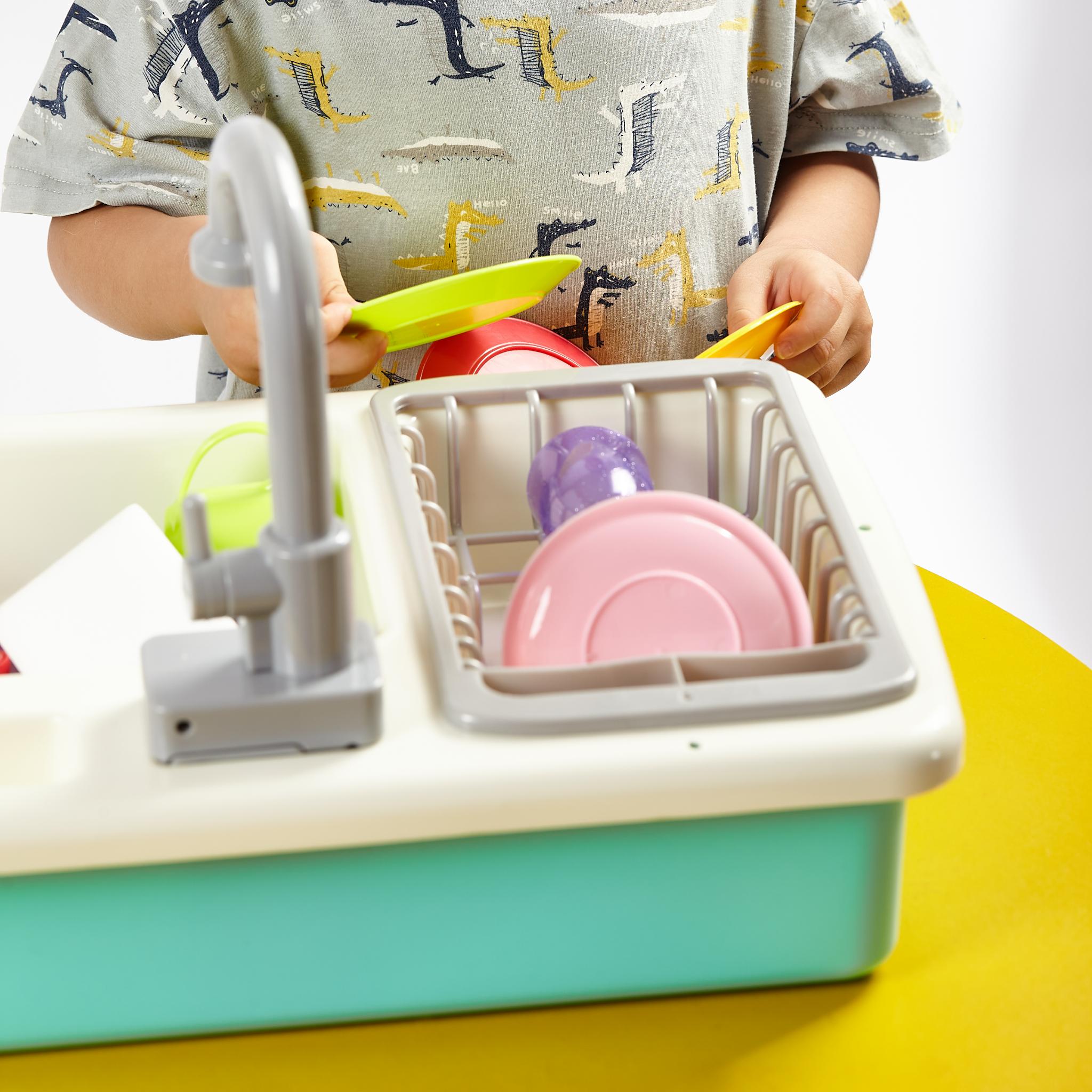 Sustainable kitchen sink including dishes