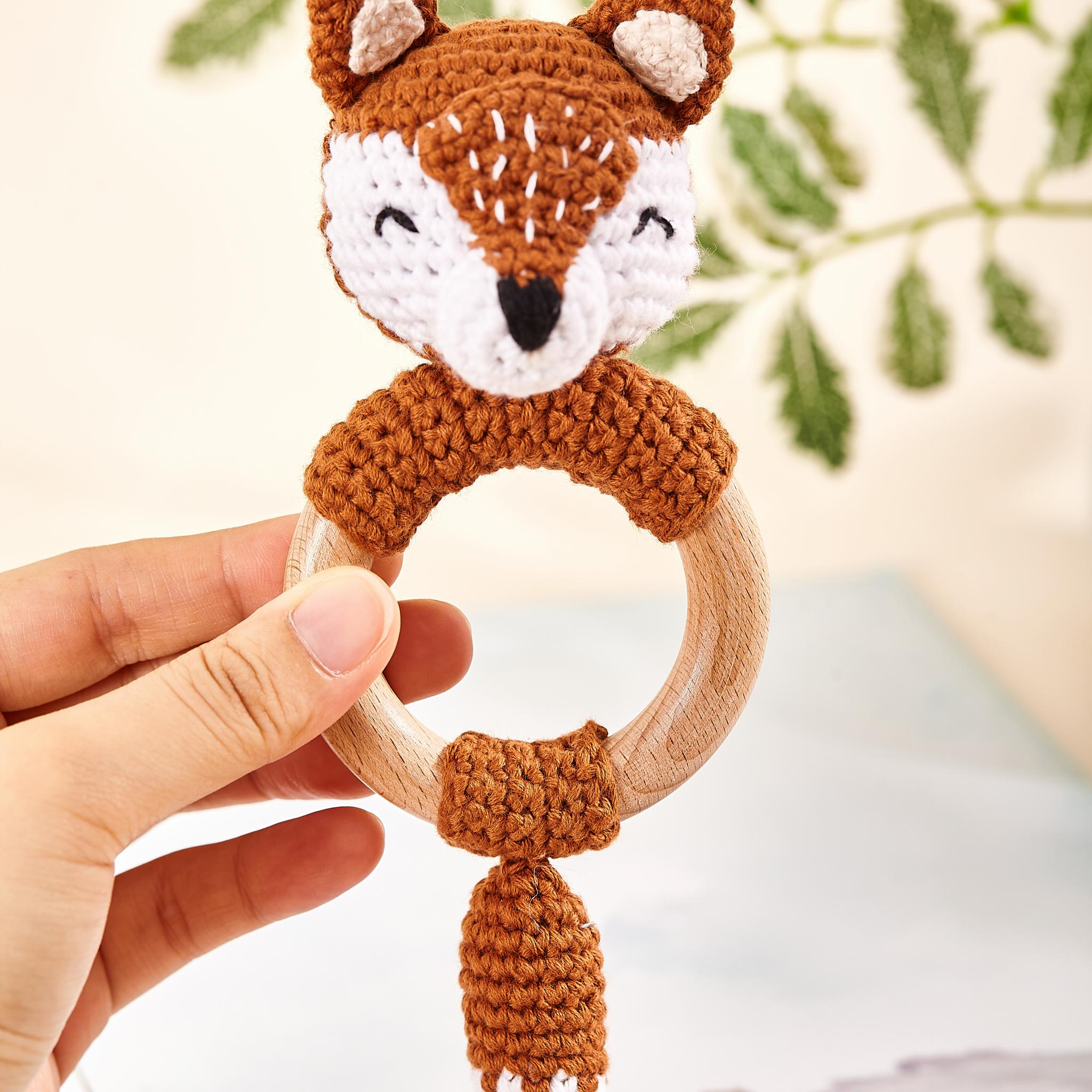 Crochet fox grasping toy made of organic cotton