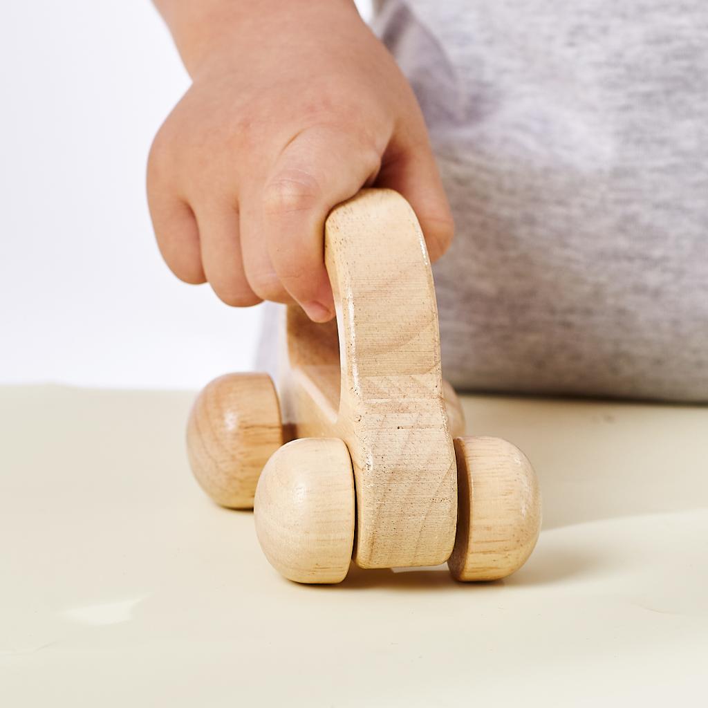 Wooden toy car with handle