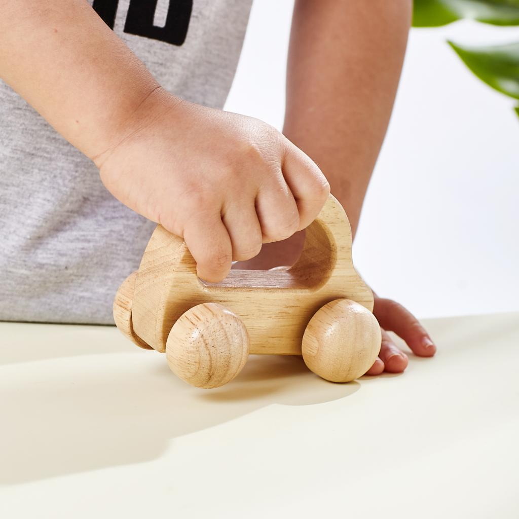 Wooden toy car with handle