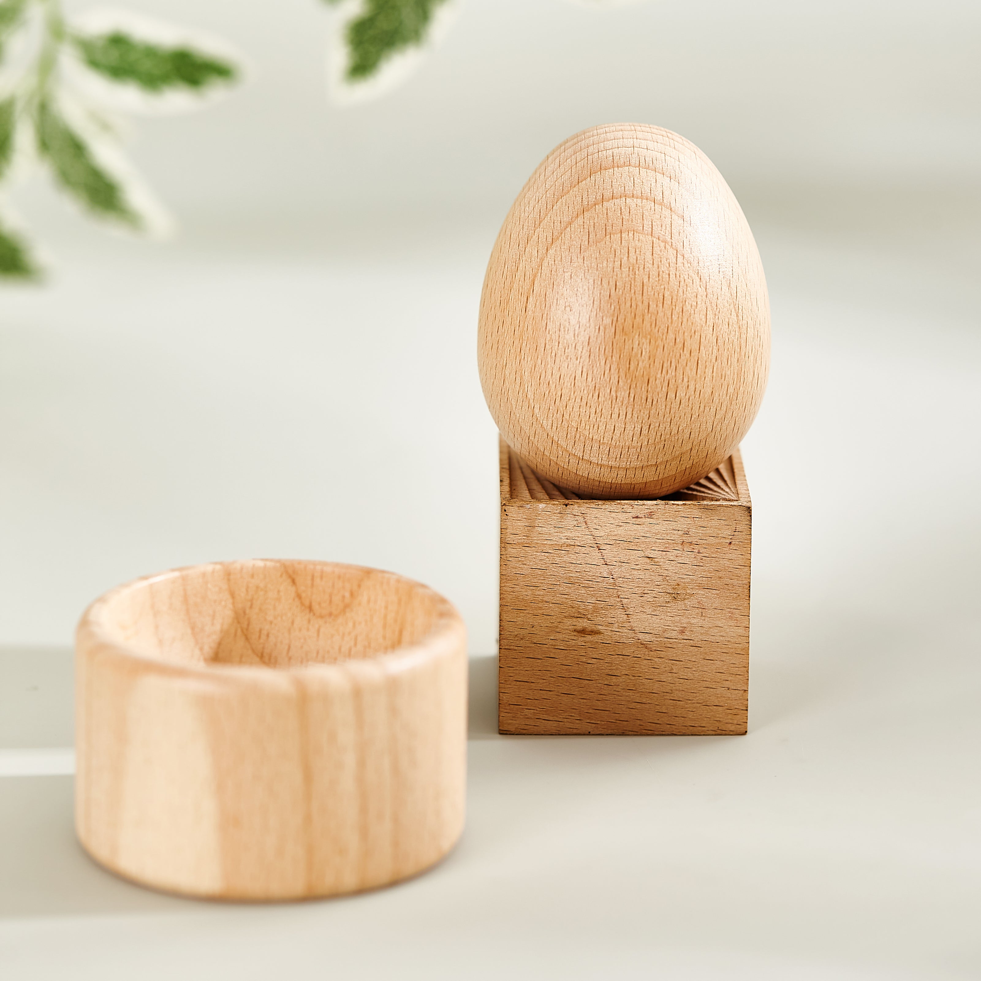 Montessori Holzspielzeug Ei mit Becher